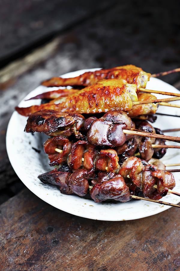 Grilled Chicken Wings And Chicken Innards Photograph by Ulf Svane
