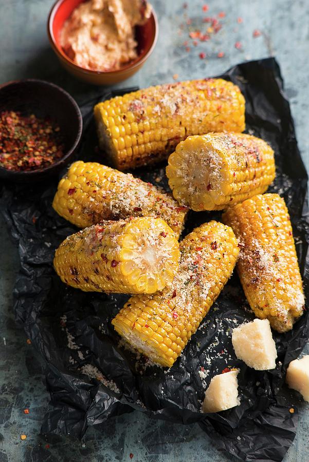 Grilled Corn On The Cob With Herb Butter And Parmesan Photograph by Ewgenija Schall