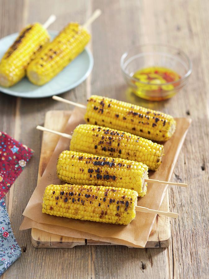 Grilled Corncobs With Garlic And Chilli Olive Oil Photograph by Rua Castilho
