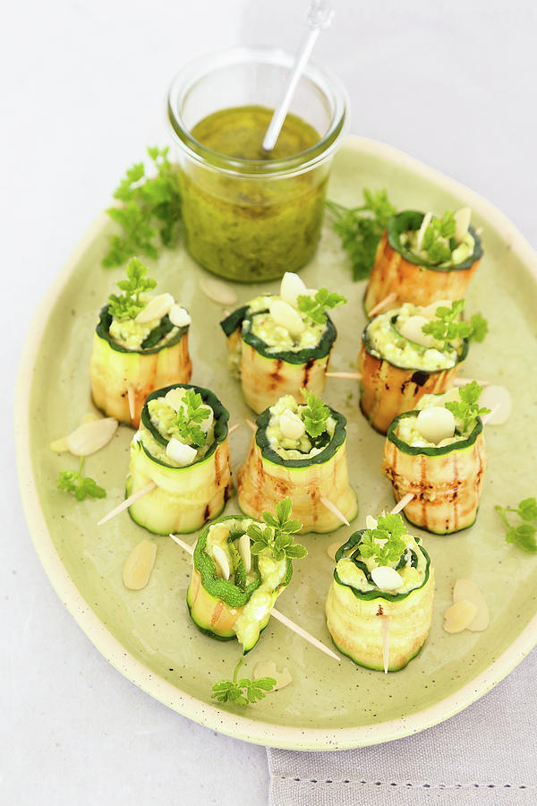 Grilled Courgettes Stuffed With Pesto, Cheese And Almonds Photograph by Claudia Gargioni