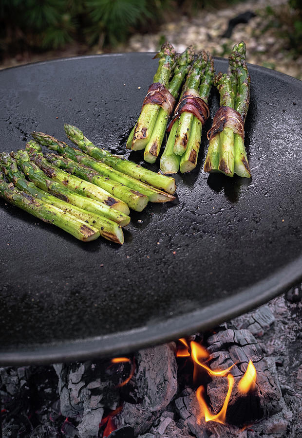 Grilled Green Asparagus With Bacon On A Charcoal Grill Photograph by M. Nlke