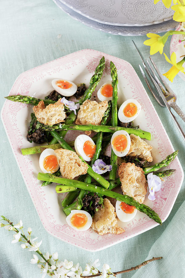 Grilled Green Asparagus With Quail Eggs, Tapenade And Bread Photograph by Winfried Heinze