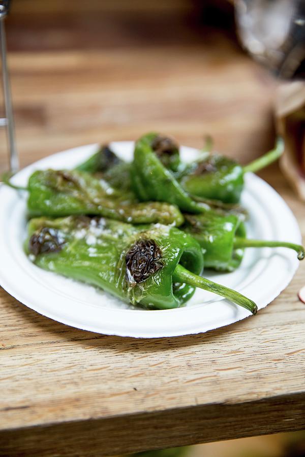 Grilled Green Padrn Peppers To Take Away Photograph by Claudia Timmann