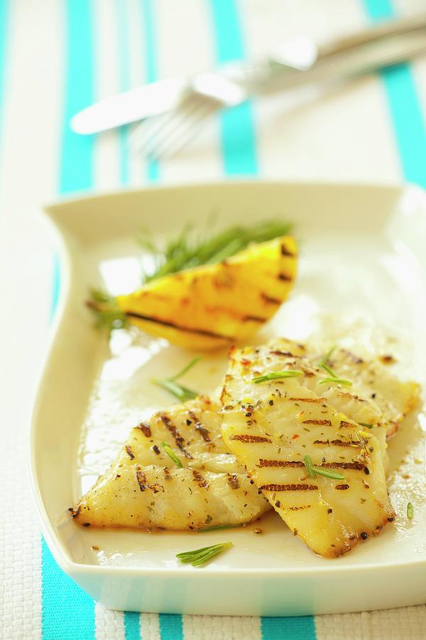 Grilled Halibut Fillets With Rosemary And Lemon Photograph by Studio Lipov