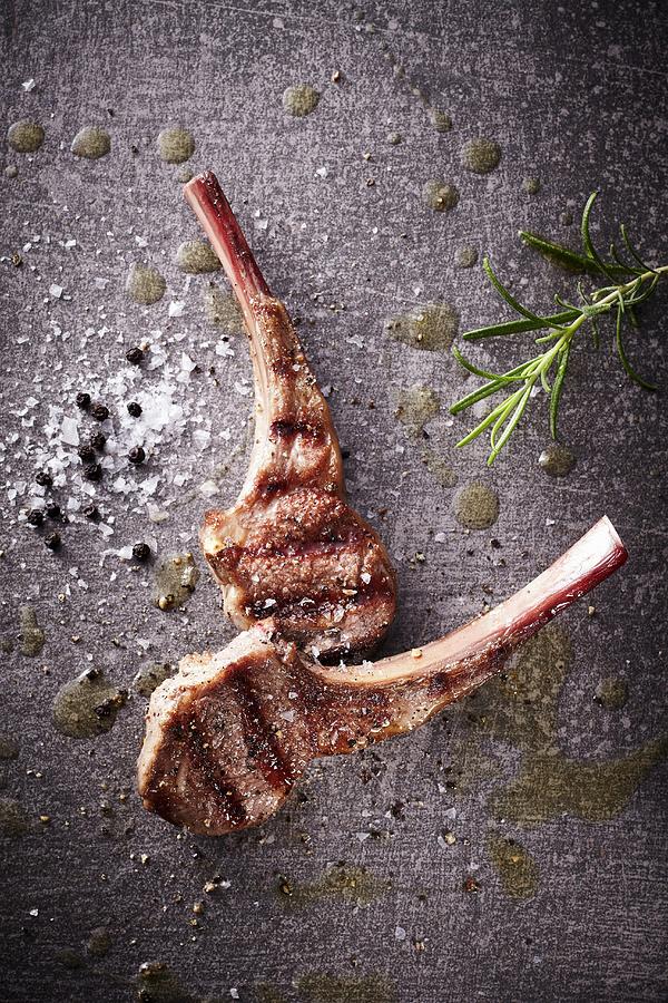 Grilled Lamb Chops With Rosemary, Salt And Pepper Photograph by Maximilian Carlo Schmidt