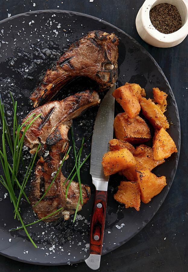 Grilled Lamb Chops With Sweet Potatoes Photograph by Robbert Koene