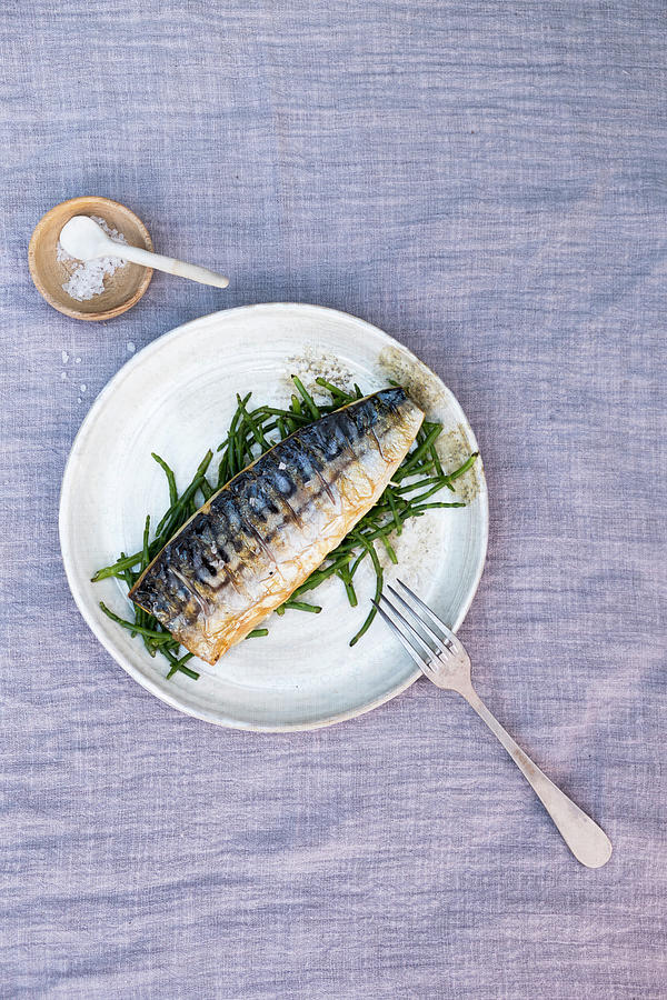 Grilled Mackerel With Samphire On A Ceramic Plate With A Little Bowl Of Salt On A Linen Cloth Photograph by Lucie Beck