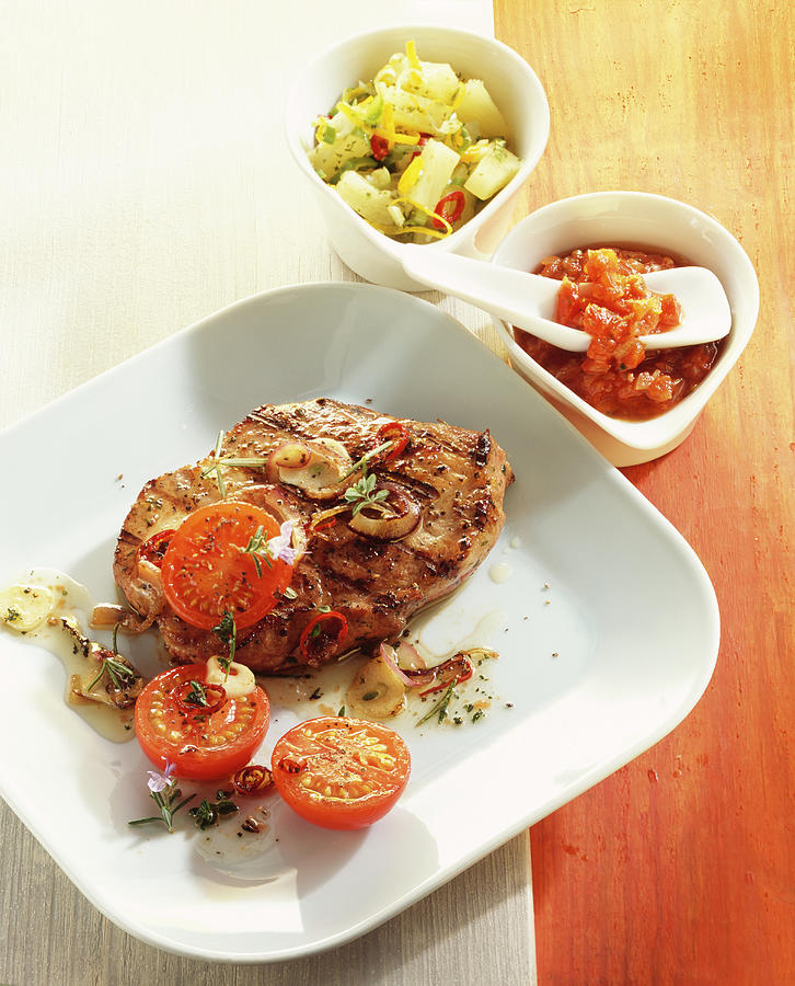 Grilled, Marinated Pork Collar Steak With Tomato Salsa And Pineapple And Chilli Salsa Photograph by Teubner Foodfoto