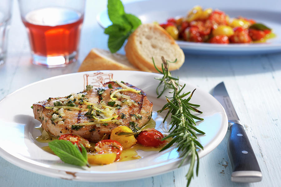 Grilled Marinated Pork Loin Steak With Roasted Tomatoes And Baguette Photograph by Teubner Foodfoto