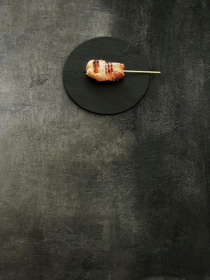 Grilled Meat Kushi On A Black Stone Platter Photograph by Mikkel Adsbl