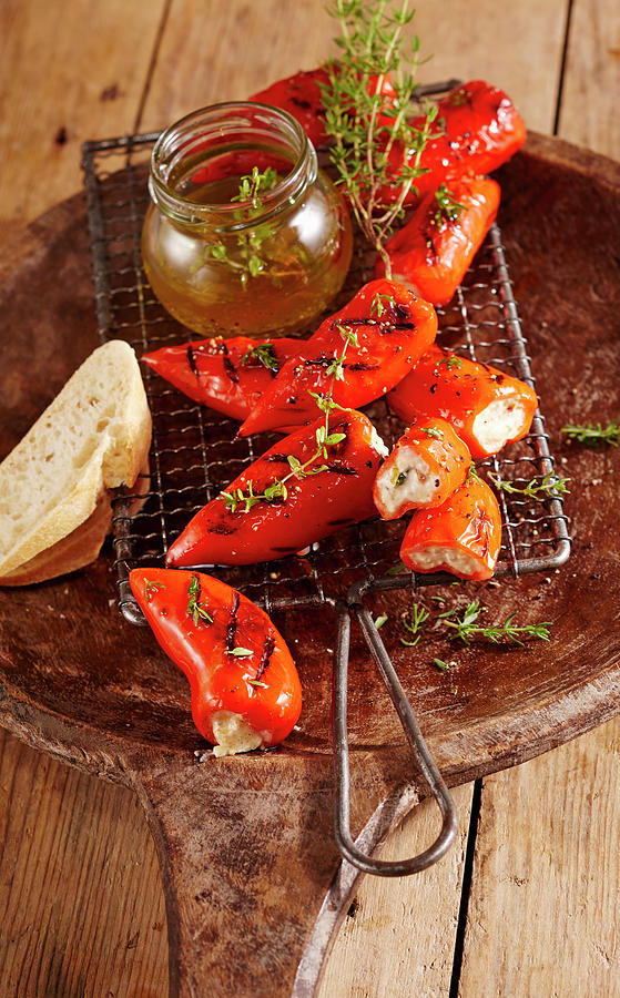 Grilled Mini Pointed Peppers Filled With Feta Cheese, White Bread And Thyme Photograph by Teubner Foodfoto