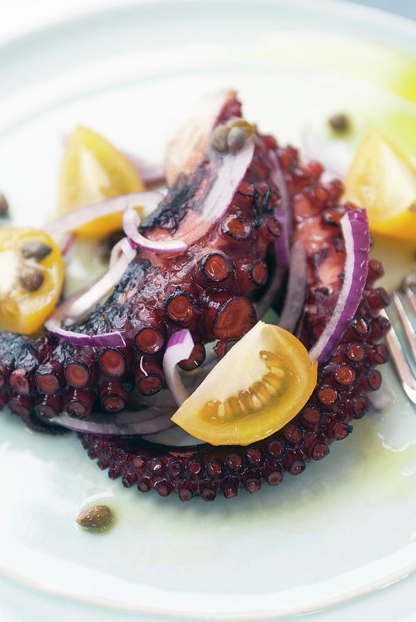 Grilled Octopus With Red Onions, Capers And Tomatoes Photograph by Spyros Bourboulis