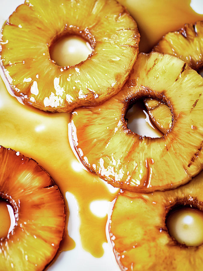 Grilled Pineapple Slices On A White Background Photograph by Sylvia Meyborg