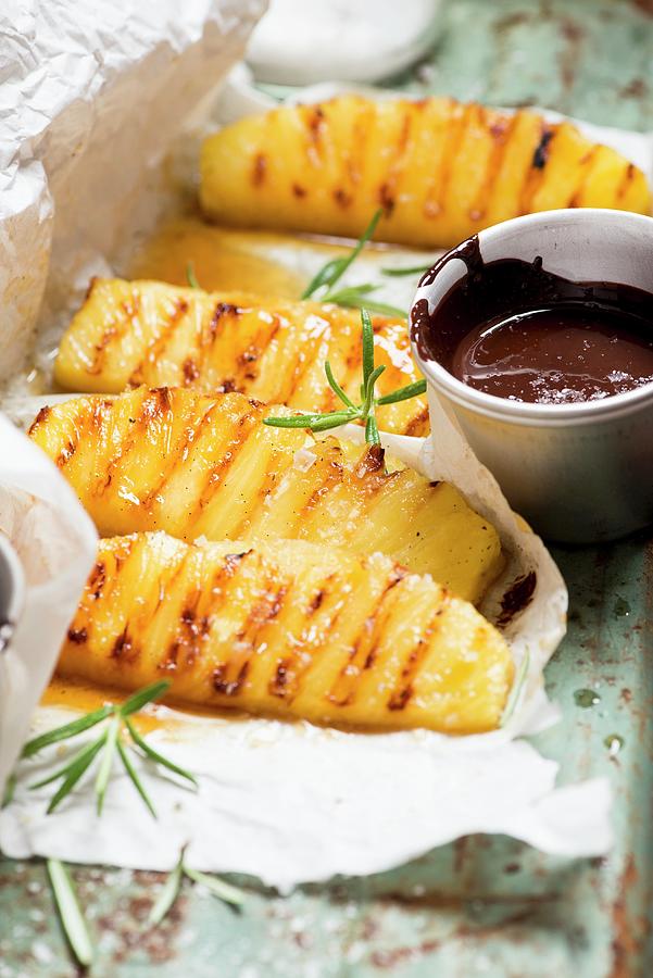 Grilled Pineapple With Chocolate Sauce Photograph by Manuela Rther