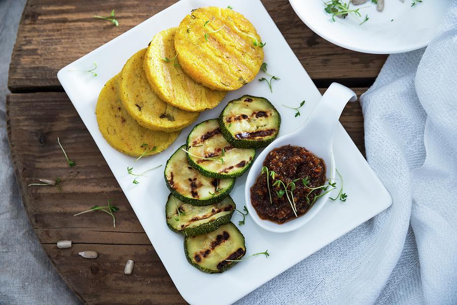 Grilled Polenta And Courgette Slices With Sunflower Seed And Tomato Pesto vegan Photograph by Kati Neudert