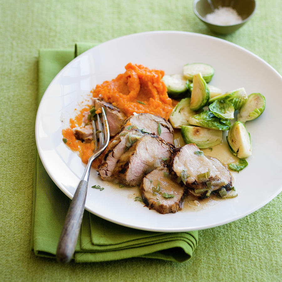 Grilled Pork Tenderloin With Apple Sage Sauce And Brussel Sprouts Photograph by Leo Gong