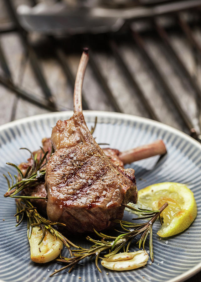 Grilled Rack Of Lamb With Rosemary, Lemon And Garlic Photograph by Nils Melzer