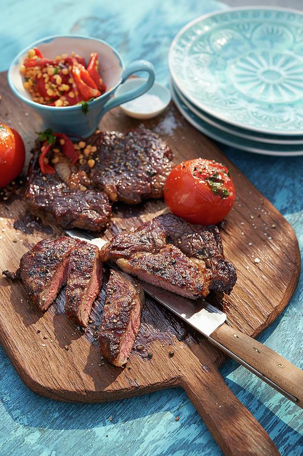 Grilled Rib-eye Steaks With Tomatoes And Lentils Photograph by Jalag / Jan-peter Westermann