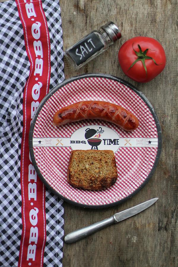 Grilled Sausage And A Slice Of Bread On A Paper Plate seen From Above Photograph by Sylvia E.k Photography