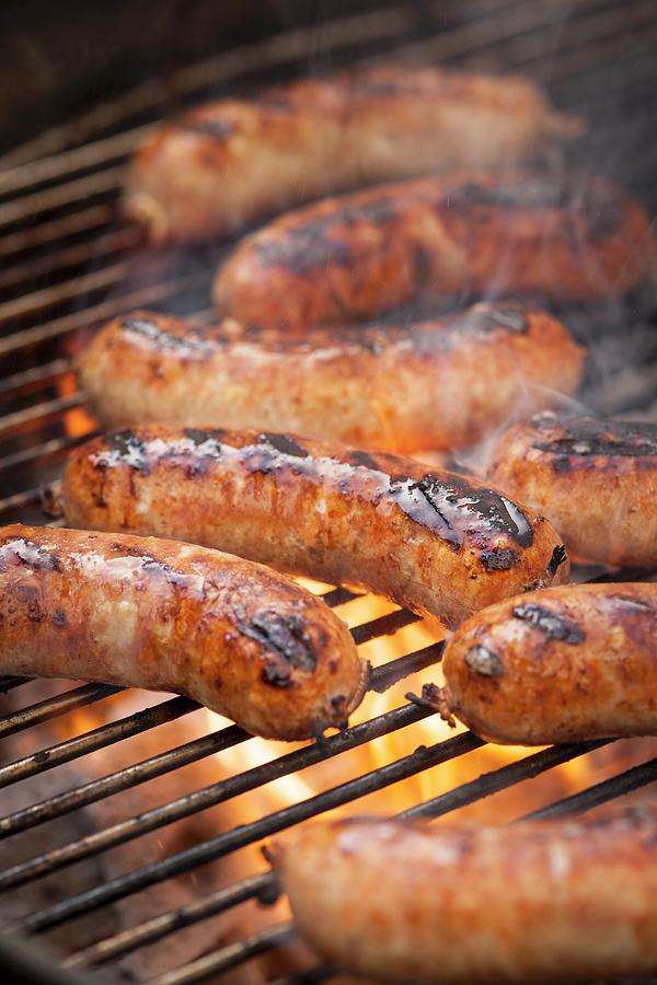 Grilled Sausages On A Grill Photograph by Eising Studio