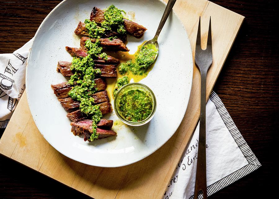 Holiday Photograph - Grilled Skirt Steak With Chimi-churri Sauce by Lisa Rees