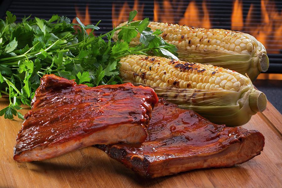 Grilled Spare Ribs And Corn Cobs Photograph by Brian Enright