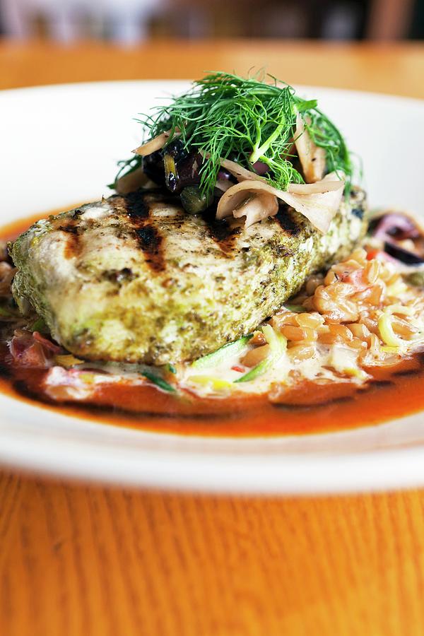 Grilled Swordfish On A Bed Of Kamut Risotto With Fennel And Kalamata Relish Photograph by Amy Kalyn Sims