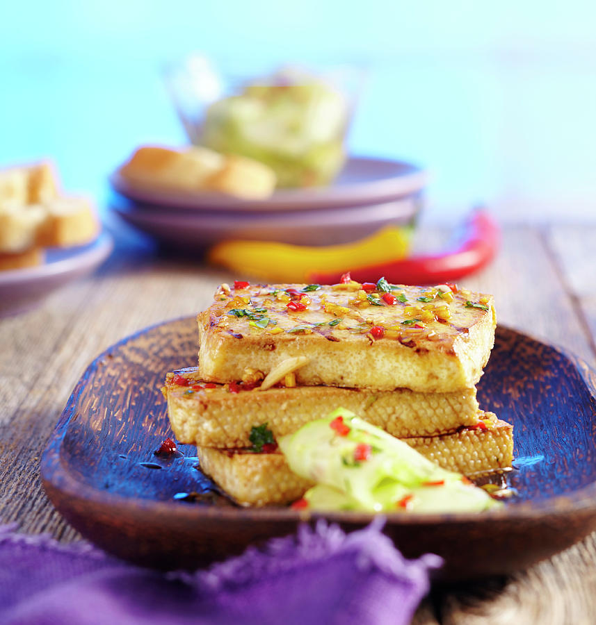 Grilled Tofu In An Oriental Marinade And A Spicy Cucumber Salad Photograph by Teubner Foodfoto