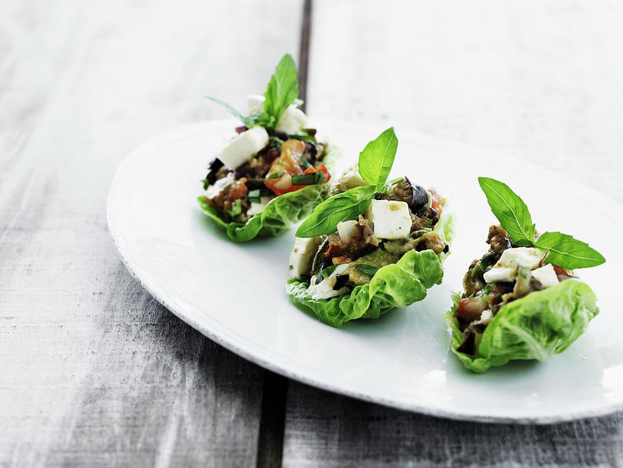 Grilled Vegetables Wrapped In Lettuce Leaves Photograph by Mikkel Adsbl