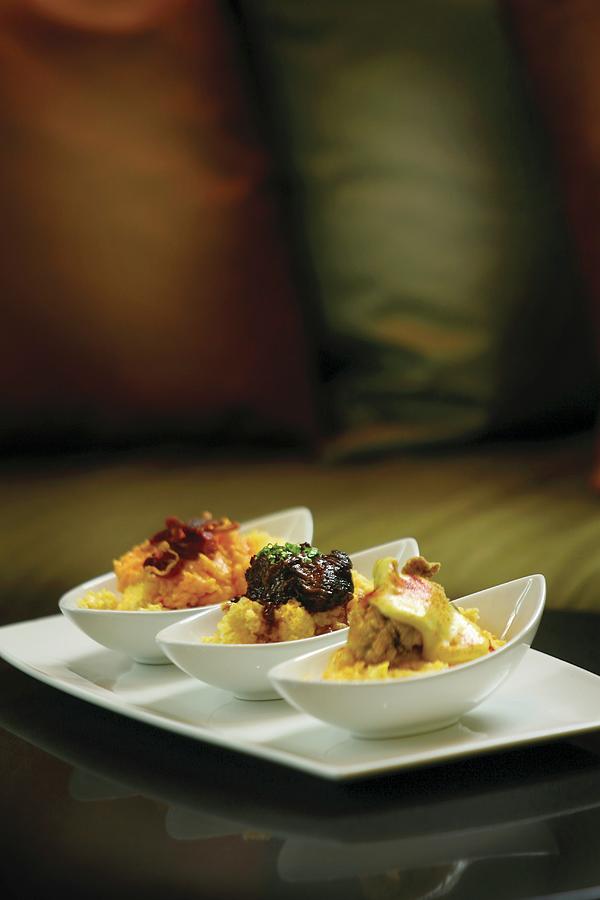 Grits Flight: Stone-ground Yellow Grits Topped With Oyster And Hollandaise, Braised Short Rib And Pimiento Cheese With Prosciutto Photograph by Cindy Haigwood