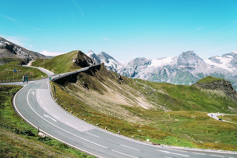 Grossglockner Road And Valley Against Blue Sky Photograph by Cavan ...