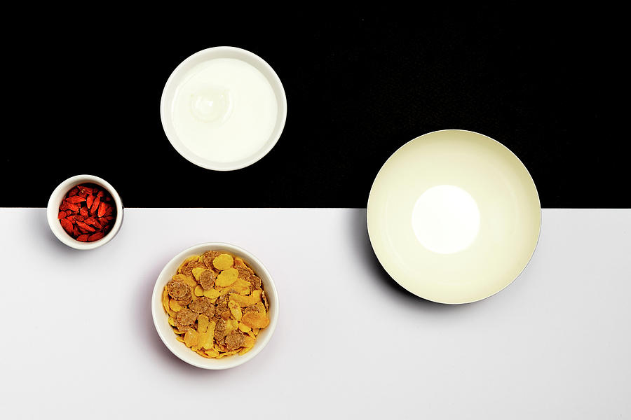 Group ceramic bowls with healthy cereal breakfast Photograph by Michalakis Ppalis