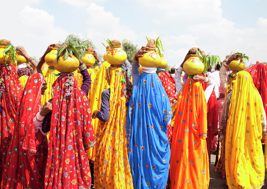 Group Of Colourfully Dressed Photograph by Grant Faint