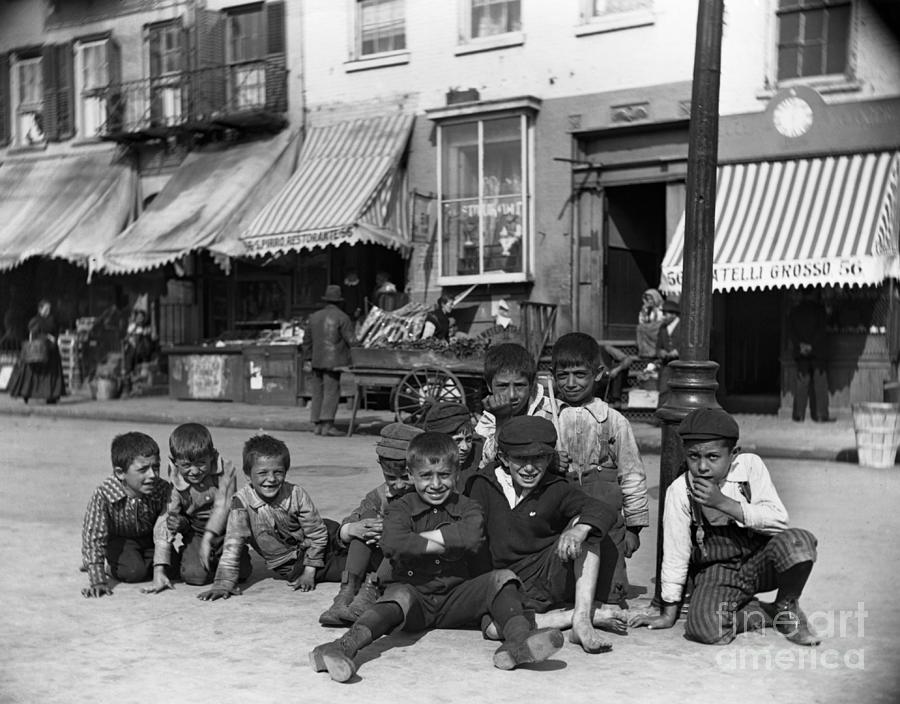 Group Of Little Boys Sitting In Street Photograph by Bettmann