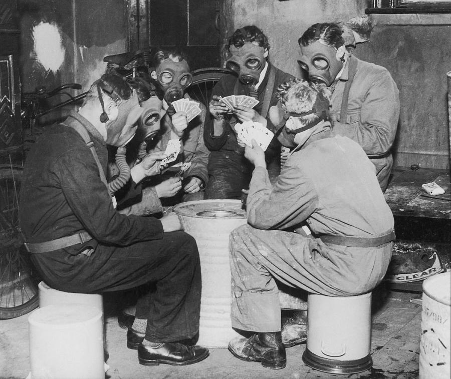 Group Of Men Playing Cards, Wearing Gas Photograph by Fpg