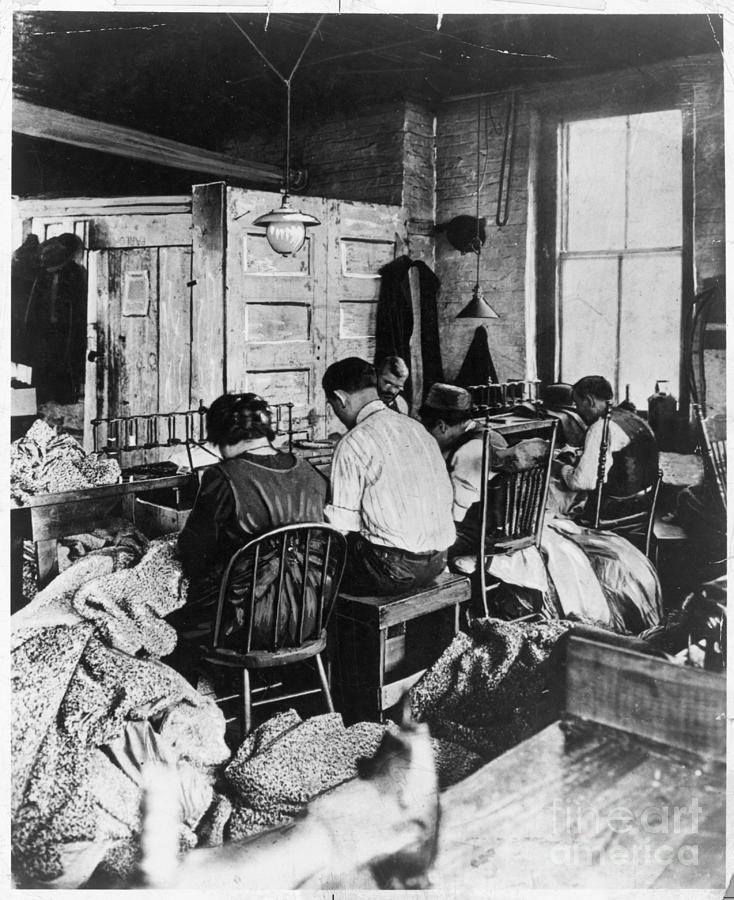 Group Of People Sitting And Sewing Photograph by Bettmann