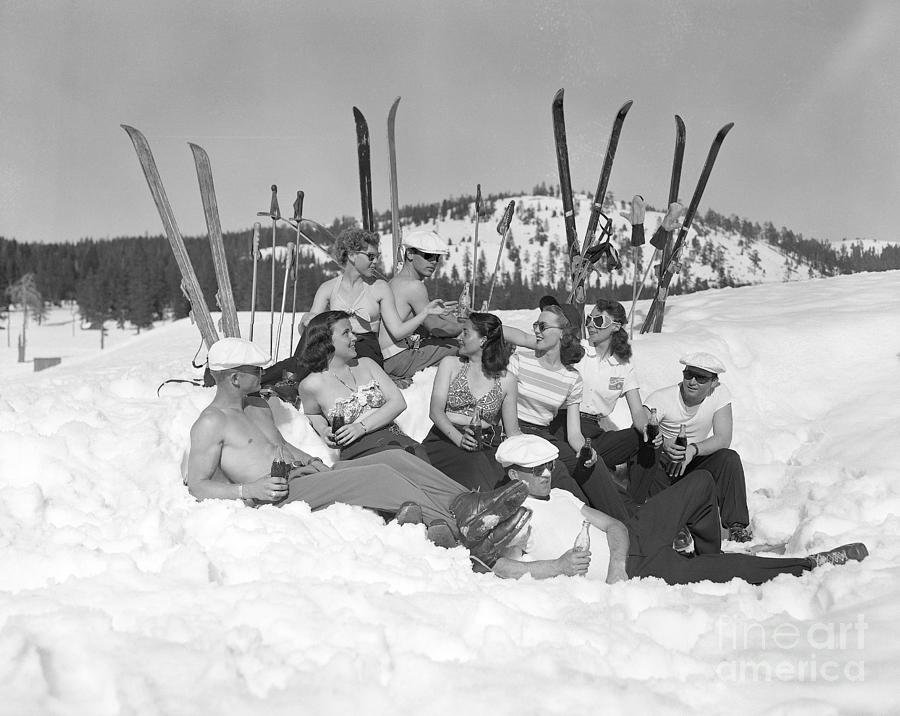 Group Of Sunbathing Skiers Photograph by Bettmann
