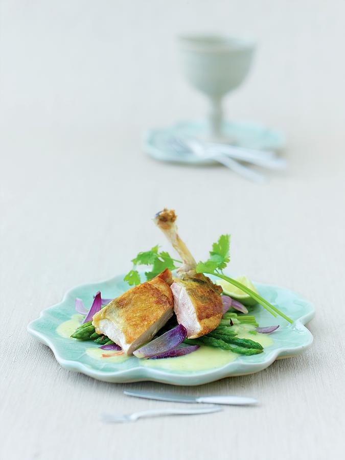 Guinea Fowl With Thai Asparagus On Plate Photograph by Jalag / Wolfgang Schardt
