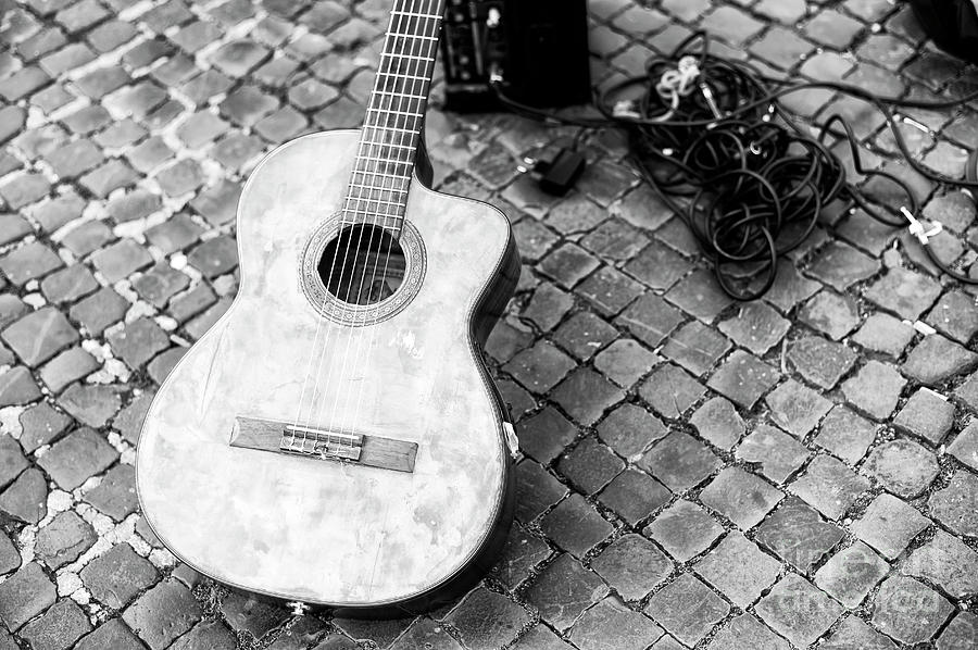 Guitar in Piazza Navona Roma Photograph by John Rizzuto