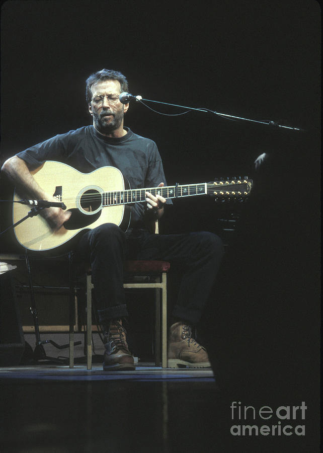 Eric Clapton Photograph - Guitarist Eric Clapton Acoustic by Concert Photos