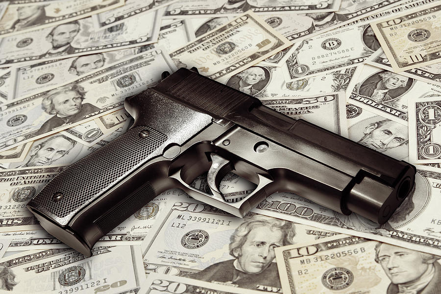 Gun on cash Photograph by Les Cunliffe - Fine Art America