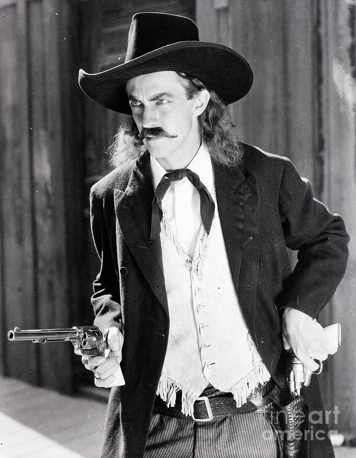 Gun Wielding Cowboy Of The Old West Photograph by Bettmann