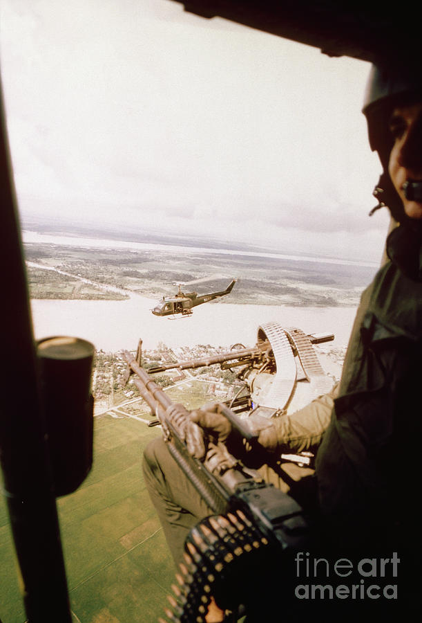Helicopter Photograph - Gunner Searching For Target by Bettmann