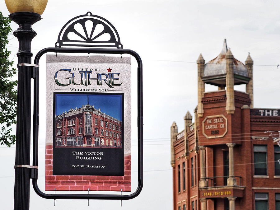 Guthrie Sign and State Capital Building Photograph by Buck Buchanan