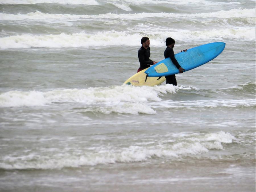 Guys Surfing In Texas Spring Time Photograph