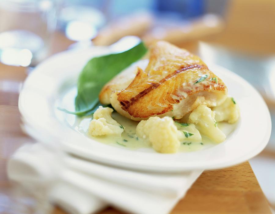 Haddock Fillet With Basil Cream Photograph by Roulier-turiot