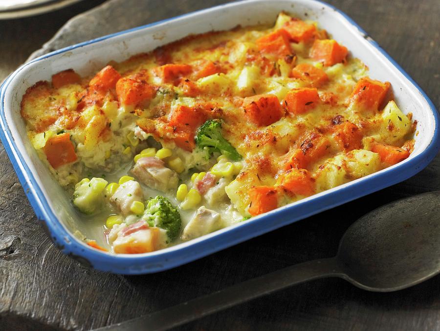 Haddock Gratin With Sweet Potatoes And Broccoli Photograph by Clive ...