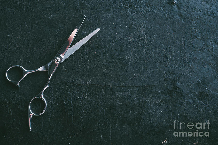 Hairdresser scissors on black background Photograph by Jelena Jovanovic