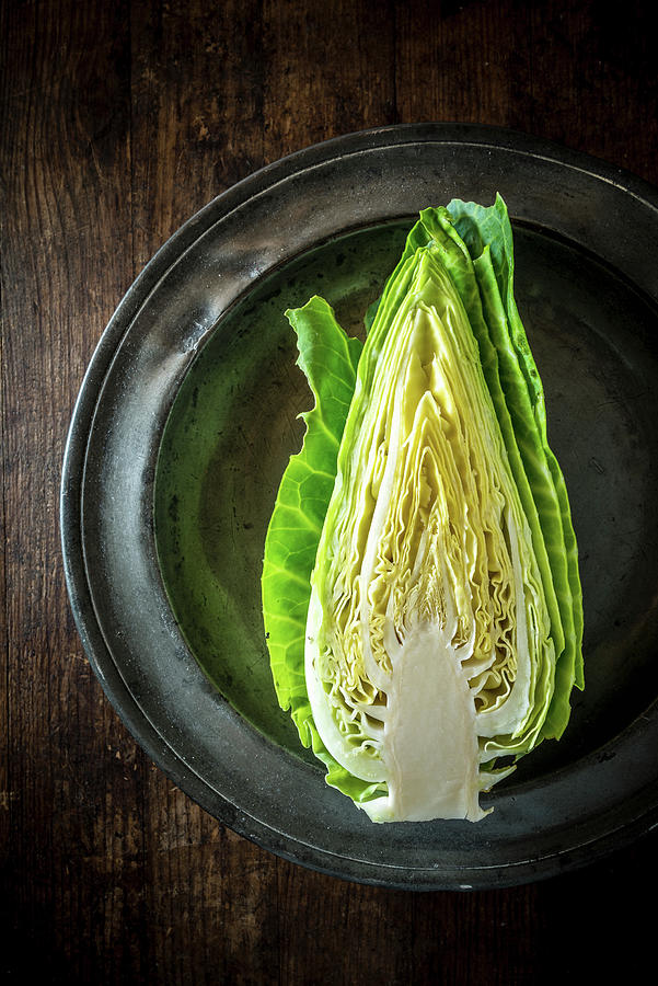 Half Cabbage On A Metal Plate Photograph by Nitin Kapoor