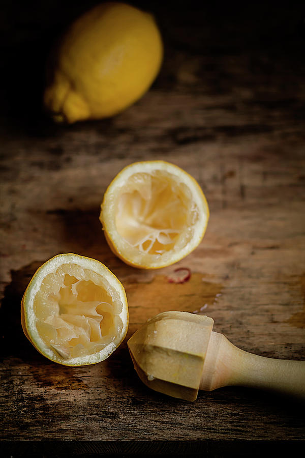 Halfs Of Squeezed Lemon,lemon And Photograph by Westend61